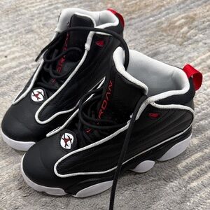Jordan Kids Black and White Sneakers with Red Accents